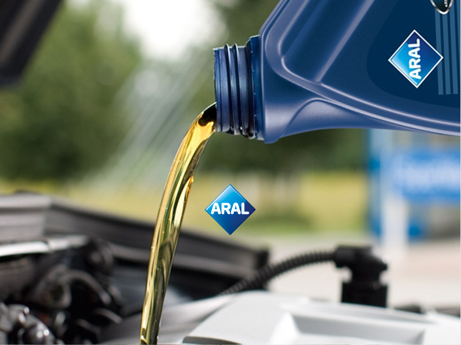 Моторное масло дано. Aral масло. Арал мотор. Aral масло логотип. Арал моторное масло реклама.